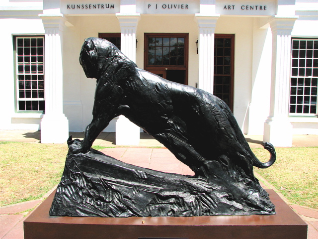 Leopard with snake