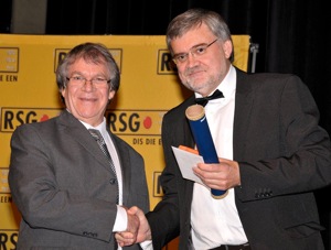 Rufus Gouws receiving the CJ Langenhoven Award